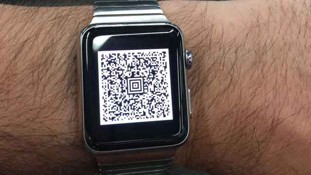 Aztec code in a smart watch app on a hand