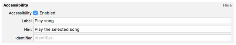 A screenshot from Xcode, showing the Accessibility pane of the Identity inspector. This pane includes a checkbox to enable accessibility, and three text fields in which you enter text for an object’s Label, Hint, and an Identifier. In this screenshot, the Accessibility checkbox is Enabled. The Label field says “Play song,” and the Hint field says “Play the selected song.” The Identifier field is blank.