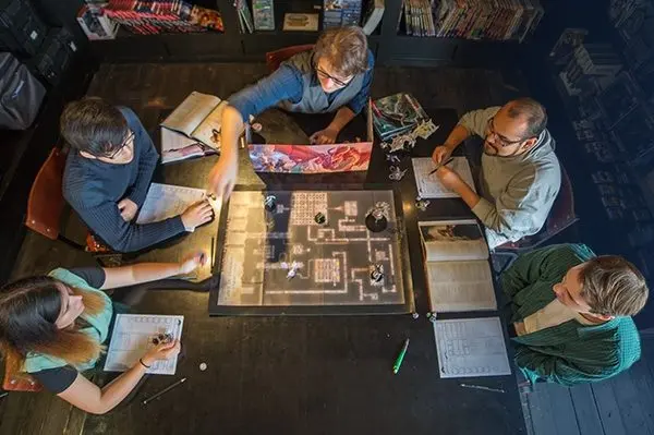 plastic game pieces on a board