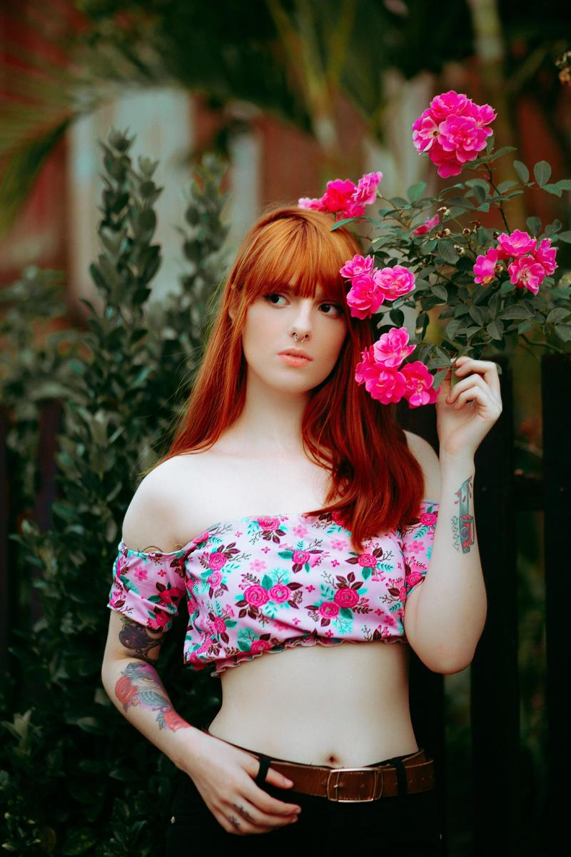 woman-standing-beside-flowers-1853424.jpg